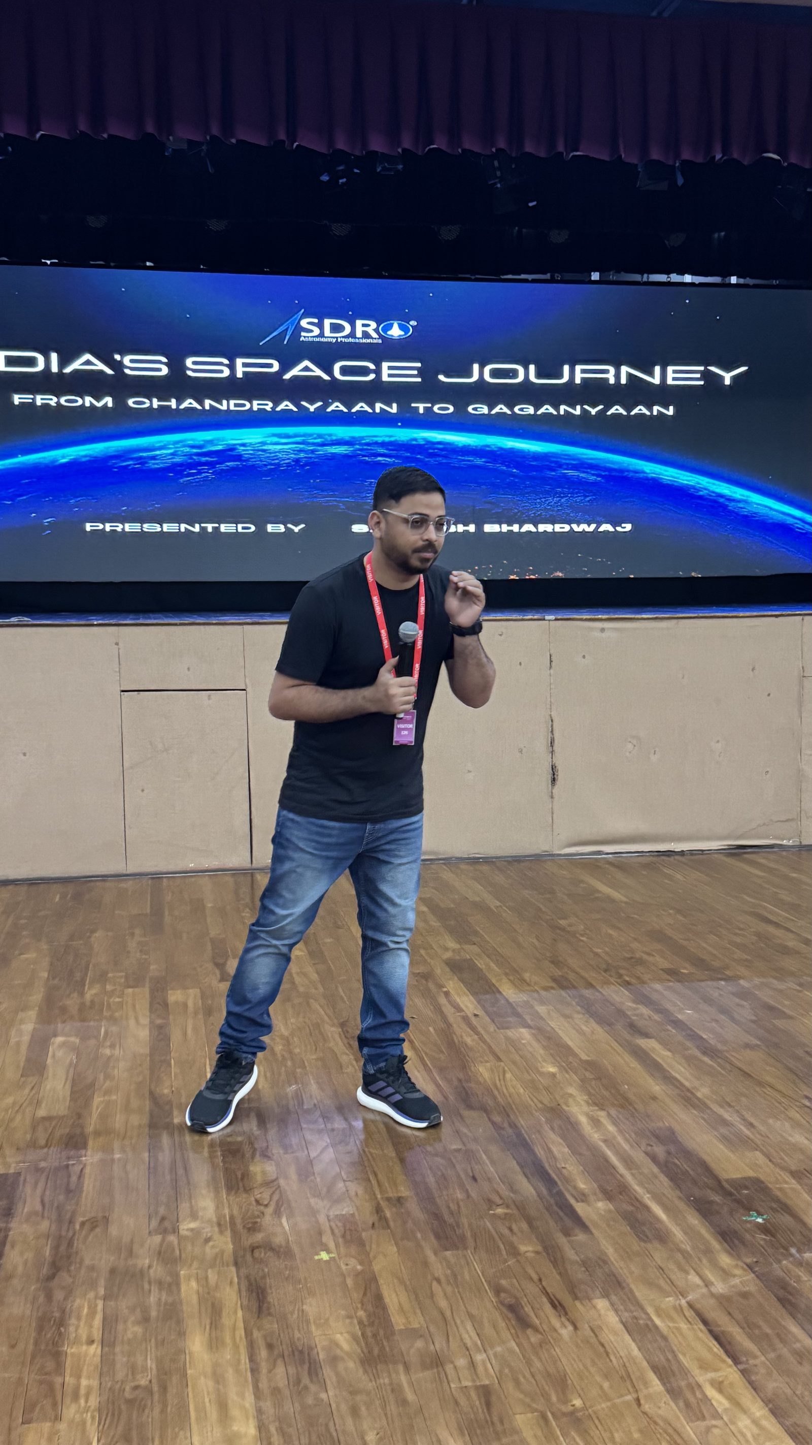 Sarvesh Bhardwaj presenting at a live event